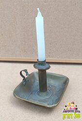 פמוט יד עתיק מנחושת